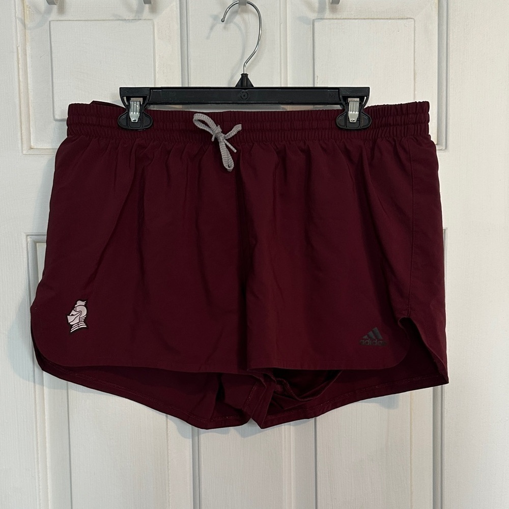 Adidas maroon shorts size XL with knight emblem